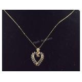 10k gold and diamond necklace 22in