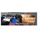 Group with bowling ball, shovel, parts to a cash