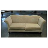 Formal, rolled arm style sofa with raised