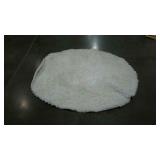 Lightweight, round, white shag rug. 5