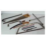 Tools: tire lug wrench, hand saws and crowbar.