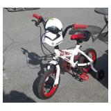 Star Wars bicycle with training wheels, chain is