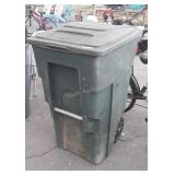 T o t e r brand trash can, 64 gallon