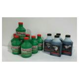 Eleven 8oz. bottles of 2-cycle engine oil. Itasca