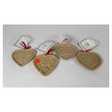 Four cookie molds by Brown Bag Cookie Art with