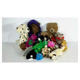 Group of plush animals, includes teddy bears,
