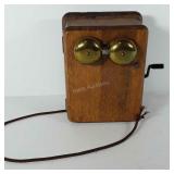 Crank telephone with wooden ringer box and brass