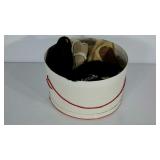 Hat box full of ladies hats, three appear to be