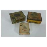 Three cigar boxes, two metal and one paper,