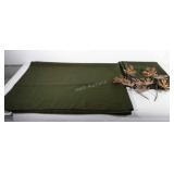 Two olive green tablecloths (60 × 144) and two