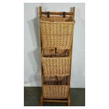 Three basket wicker magazine rack, 46" tall