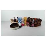 Two wicker baskets of mostly perfume and lotions,