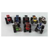 Toys, eight monster trucks, some hotwheels