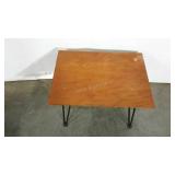 Metal legged table, 15" tall, stamped on the