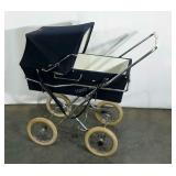 Baby pram, folds for storage, basket is