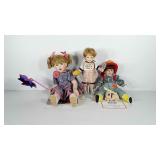 Three porcelain dolls, includes David and Mark