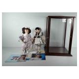 Two porcelain dolls with certificates of