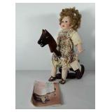 Porcelain doll with certificate of authenticity,