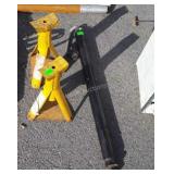 Set a yellow 2 ton jack stands and black trailer