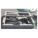 Wooden tote with Axe Heads and chisels