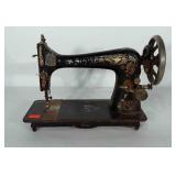 Singer sewing machine without cord or pedal.