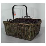 Woven basket with metal handle. Basket without
