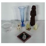 Mixed home decor: blue etched glass vase, wooden