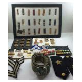Military patches, pins, and buttons some in a
