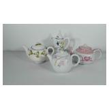 Four teapots includes Mikasa, teleflora, one