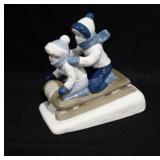 Paul Sebastian sledding figure, made in Mexico