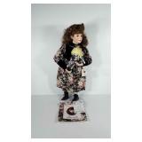 Porcelain doll with stand, and certificate of