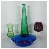 Glassware: Green decanter and purple pedestal