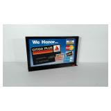 Metal credit card advertising sign in display