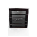 Wooden display shelf with metal FIA emblem at the