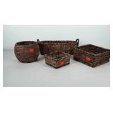 Four woven baskets in various shapes and sizes