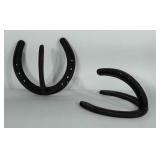 Horseshoe art, 2 wall hooks made from horseshoes.