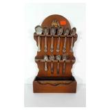 Wooden spoon display with spoons, some are