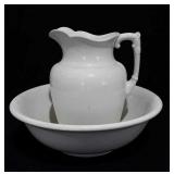 Wash basin and pitcher, all white. Stands 11