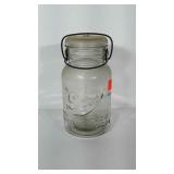Quart sized "Drey" canning jar with glass lid.