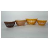 4 Pyrex mixing bowls. 2 are the Butterfly Gold