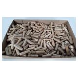 Wooden pegs with spiral design, plus some other