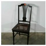 Caned side chair, seat worn and drooping as shown