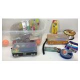 Plastic container with fishing lures and supplies