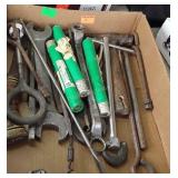 Flat of drill bits, large wrenches,  two axes