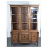 China Closet. Flat wall. Double glass doors atop,
