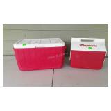 Two-piece light Coleman cooler and Playmate Igloo