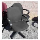 Two Office Desk Chairs, black fabric seating,