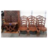 Dining table with two leaves and six chairs.