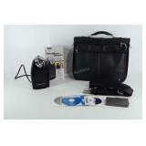 Dell laptop case with strap, system CDs, and