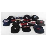 Group of baseball hats, most well worn